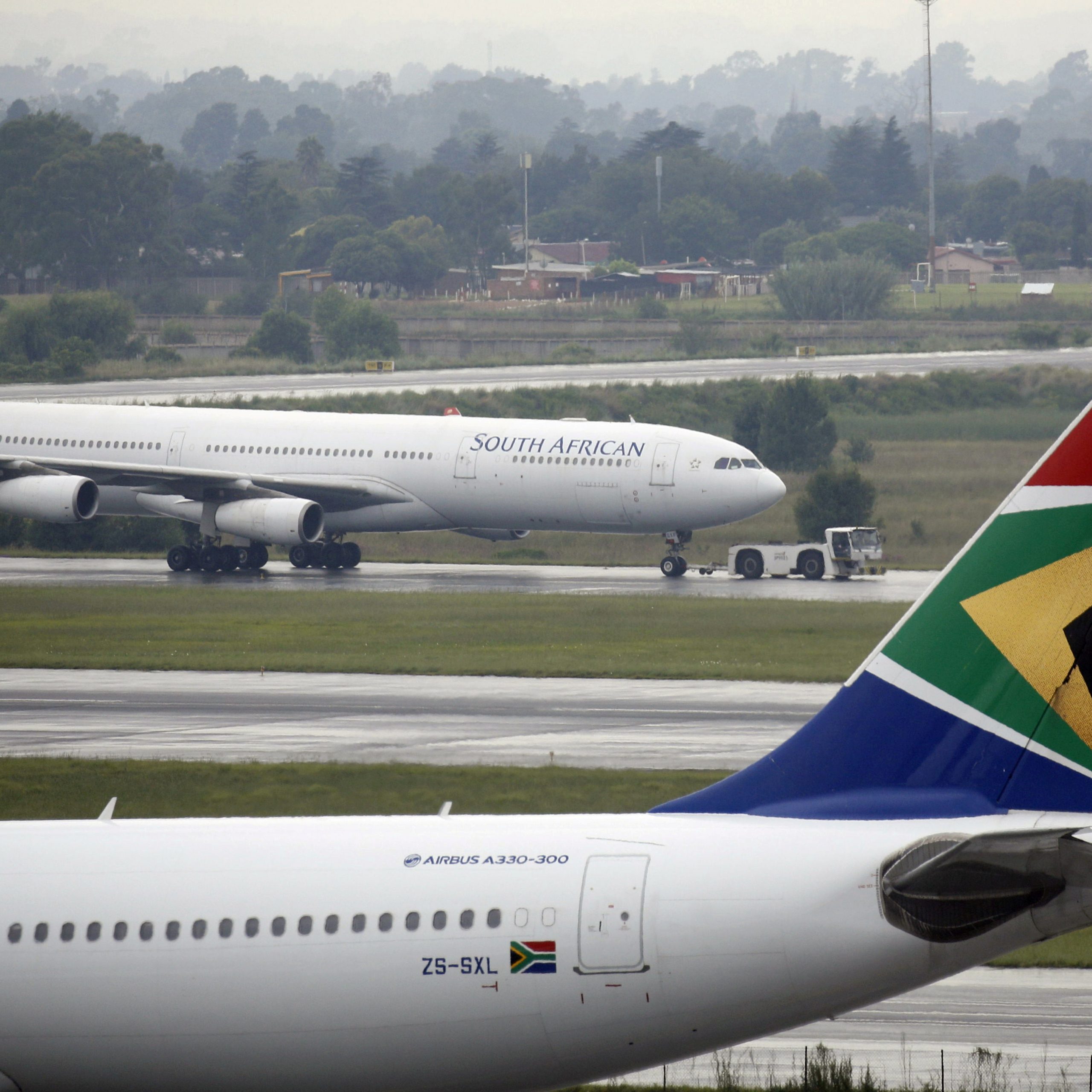 FILE PHOTO: A South African Airways (SAA) plane is towed at O.R. Tambo International Airport in Johannesburg